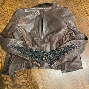 Brown leather jacket with gorgeous detail.